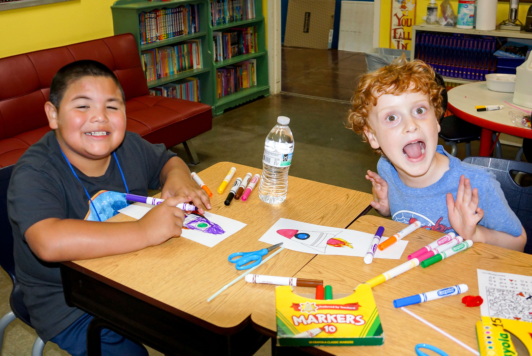 Boys coloring at Camp TeSA TCA+A's in Fort Worth
