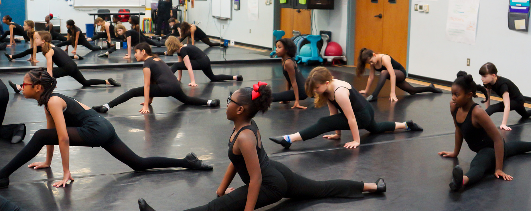 Young dancers in costume performing at TCA+A's Fine Artsin Fort Worth