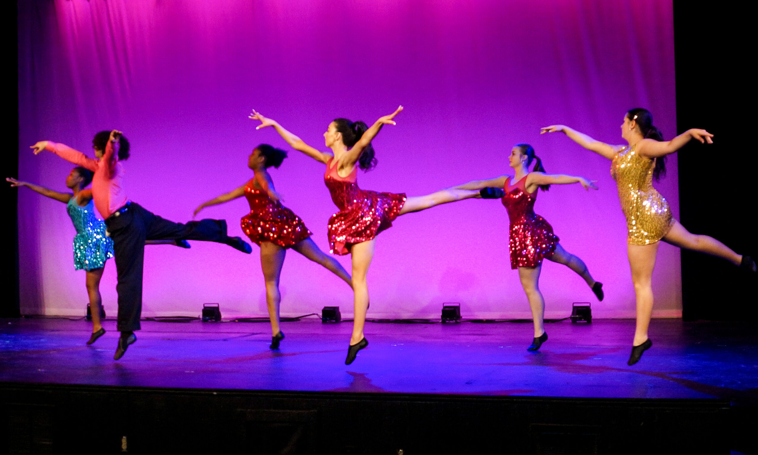 Young dancerson stage in a musical at TCA+A's Fine Arts in Fort Worth