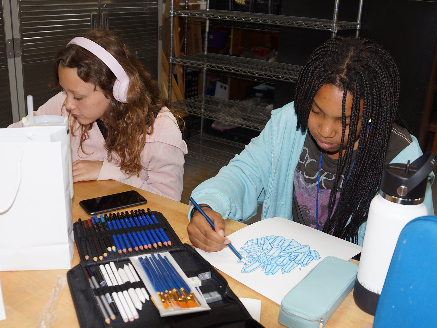 Young artist painting at TCA+A's Fine Arts in Fort Worth